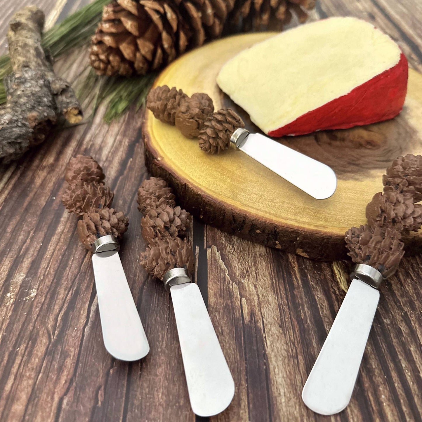 Pinecone Polyresin Cheese Spreader